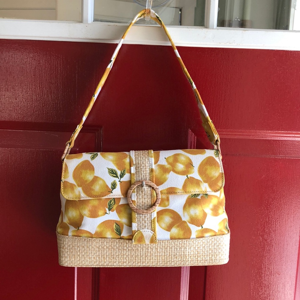 Canvas lemons and straw purse